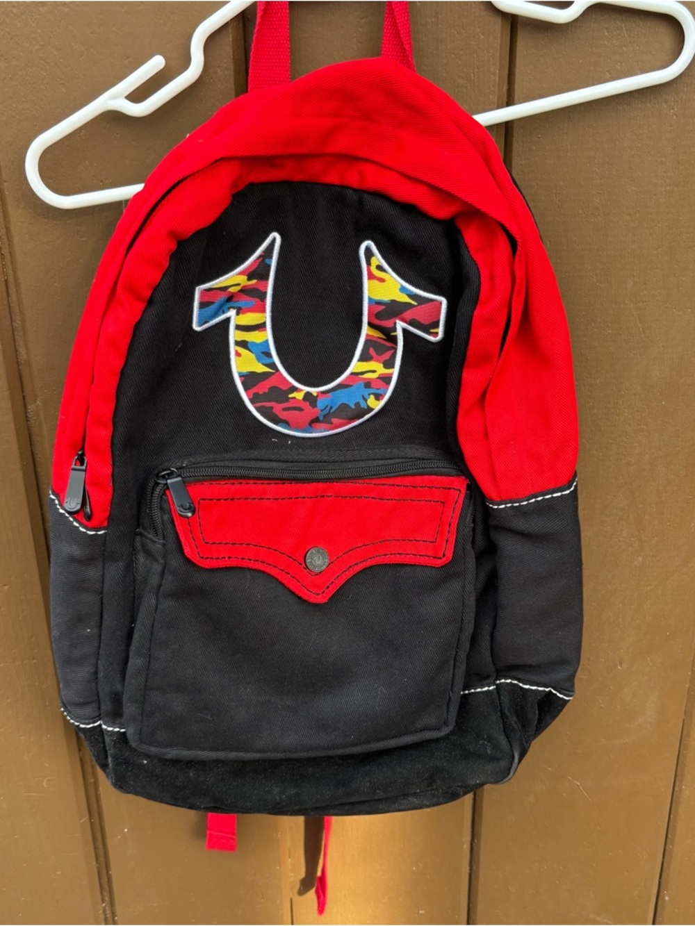 True Religion Red and Black Backpack with Multicolor Camo Logo